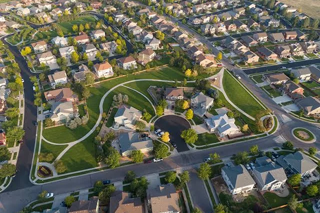 Aerial view of a park and neighborhoods in Brighton, CO