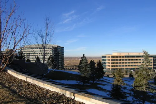 Modern office buildings beside open space in Broomfield County, CO
