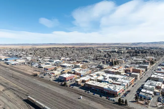 Aerial view of downtown Laramie, WY beside the rail yard