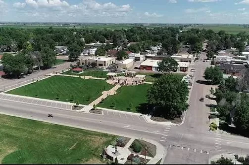 Aerial view of a town park and civic buildings in Weld County, CO